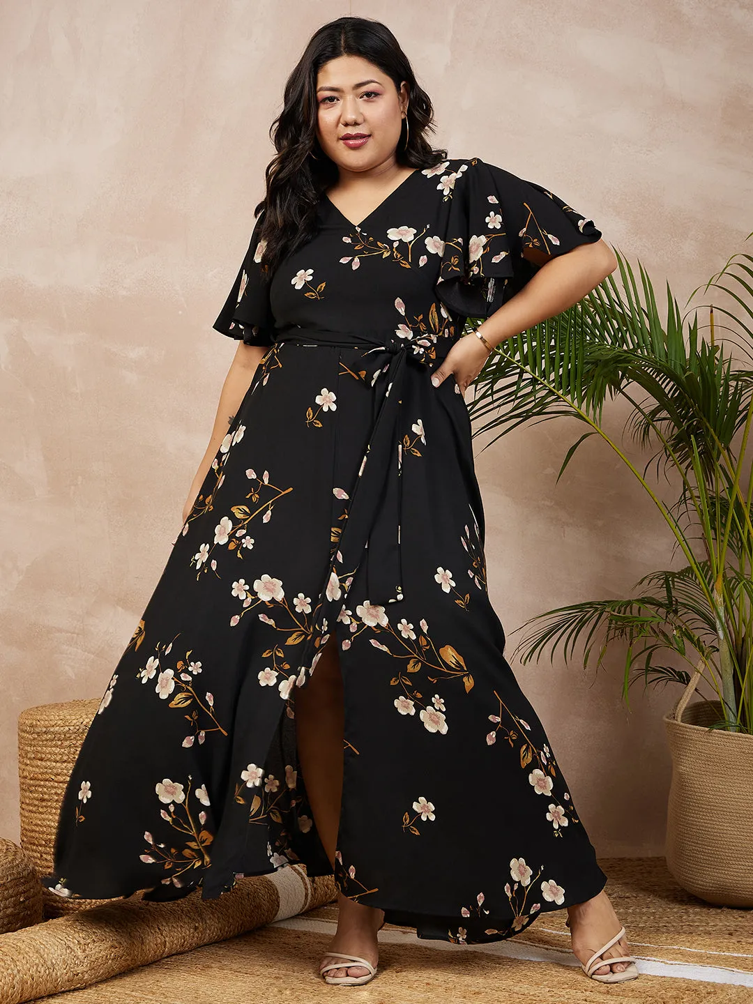 Berrylush Women Plus Size Black & White Floral Printed V-Neck Tie-Up Flutter Sleeve Thigh-High Slit Flared Wrap Maxi Dress