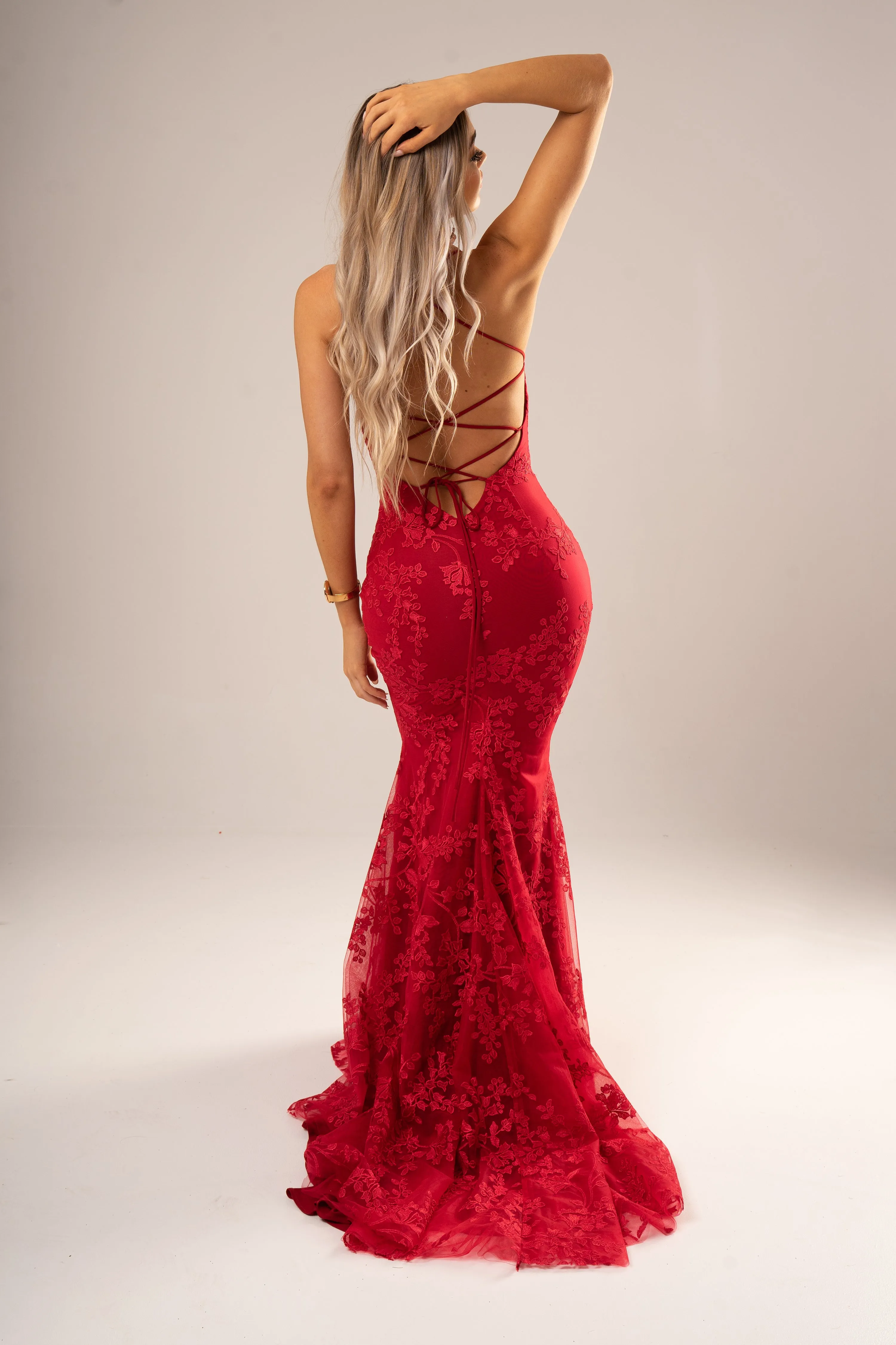 Deep red lace criss-cross back mermaid dress for hire