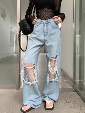 Mid Waisted Raw Hem Flared Bottom Jeans