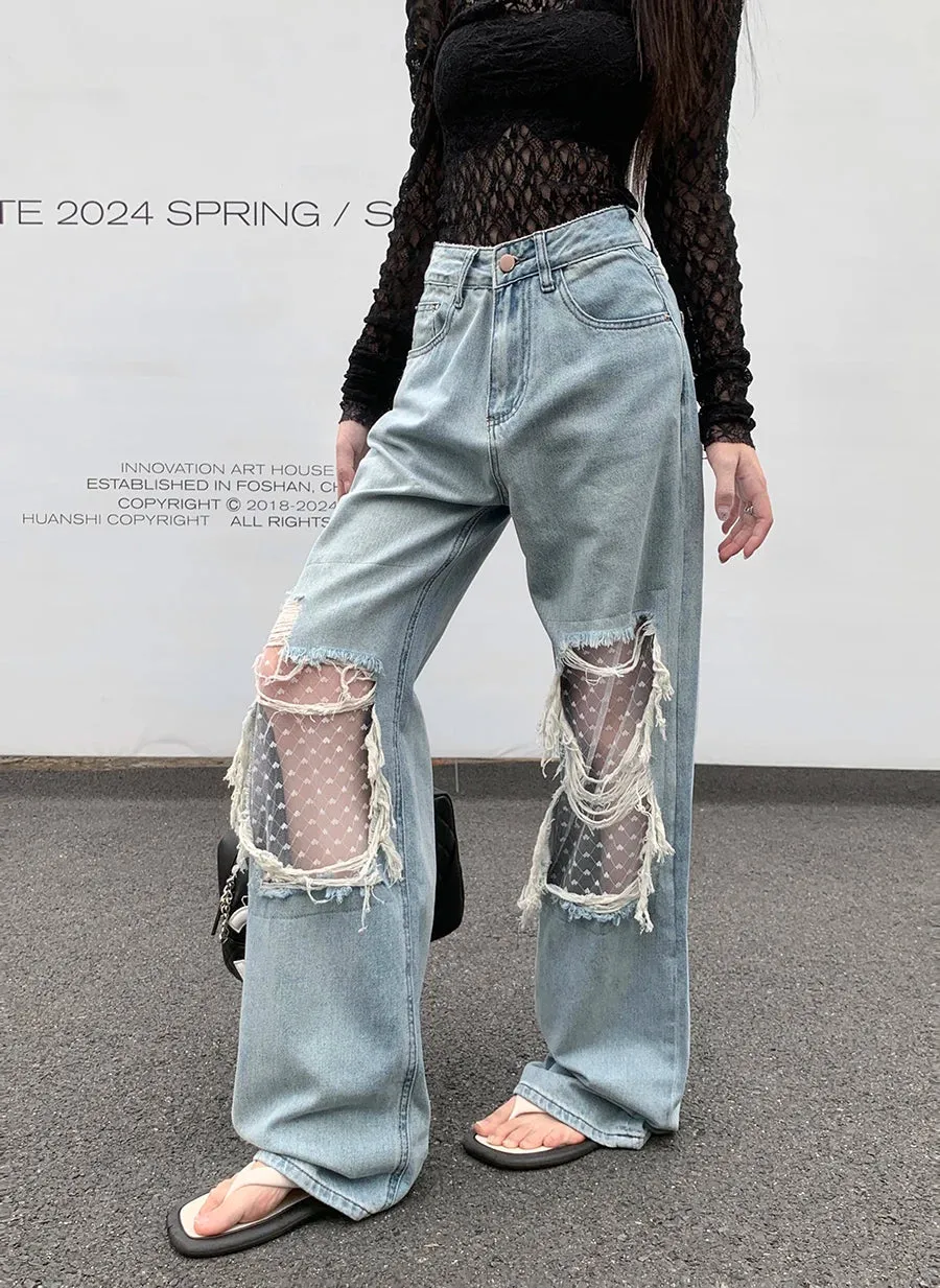 Mid Waisted Raw Hem Flared Bottom Jeans